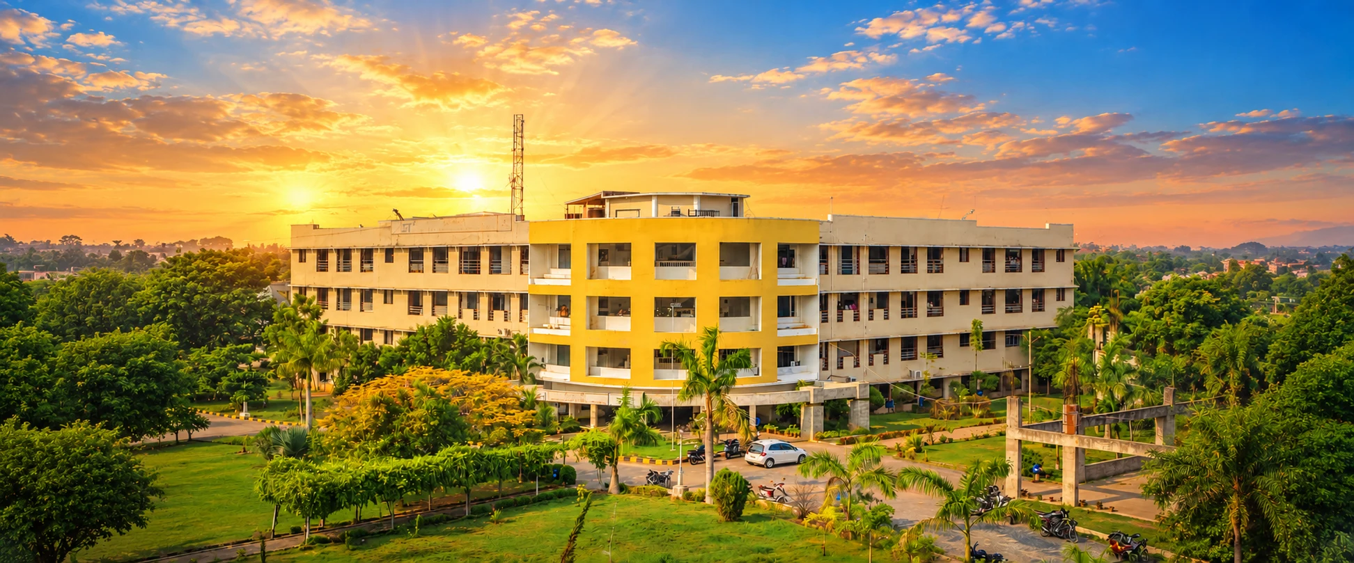 25 Years of Vision: From Engineering Blueprints to 53 Campuses — ACHARIYA Campus Panorama at Golden Sunrise